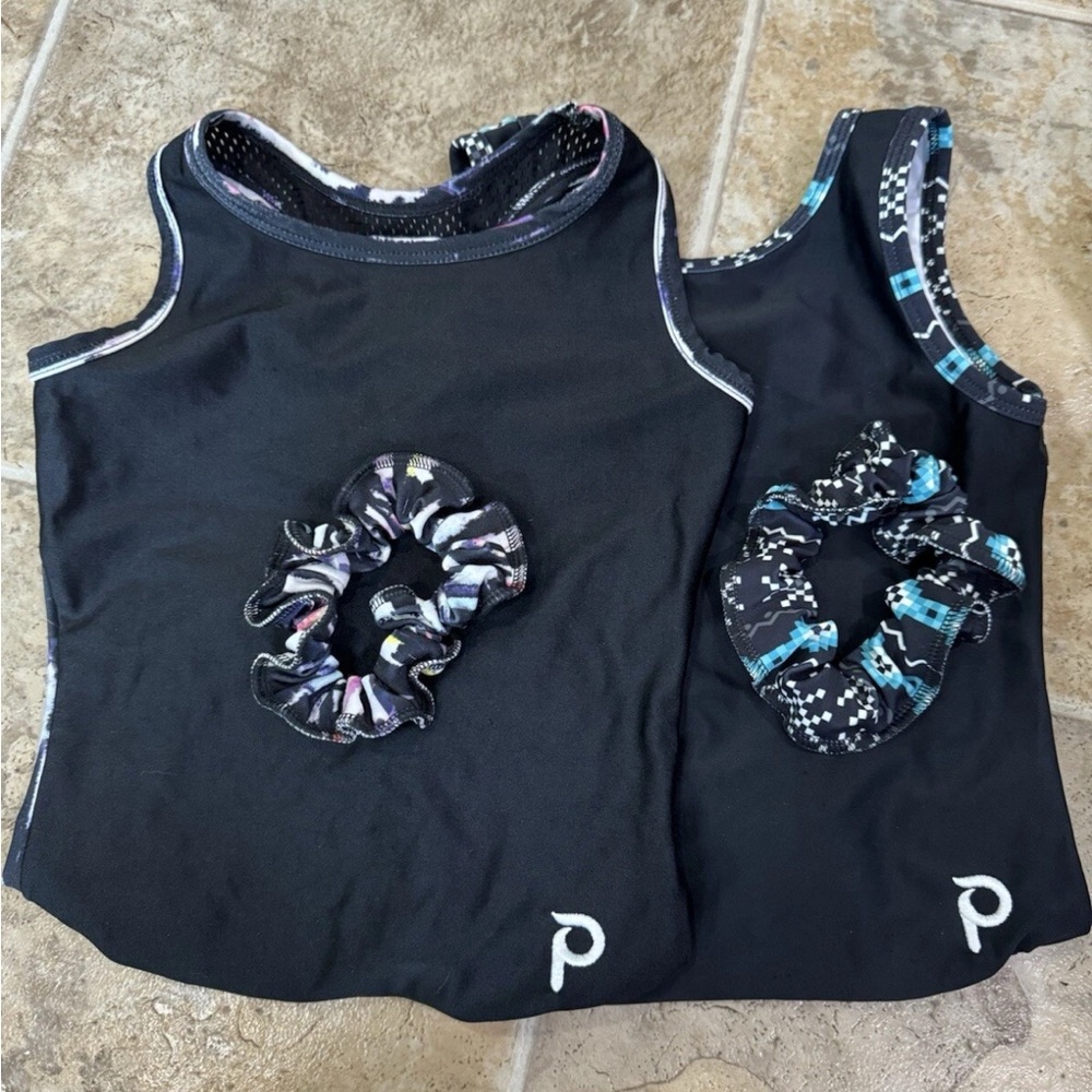 2 Plum leotards (child medium)